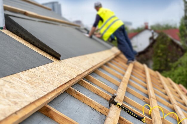 building-construction-process-new-wooden-roof-wood-frame-house_754108-3609