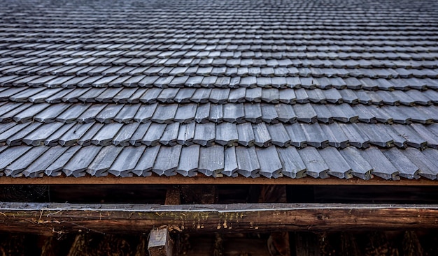 closeup-roof-house-made-wooden-tiles_169016-25417