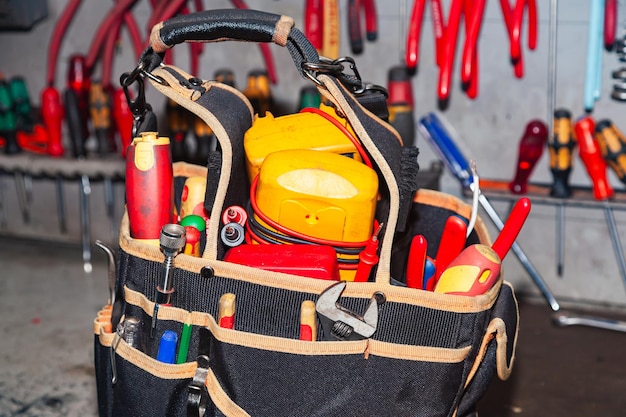 electricians-bag-full-tools-stands-workshop_187194-5060
