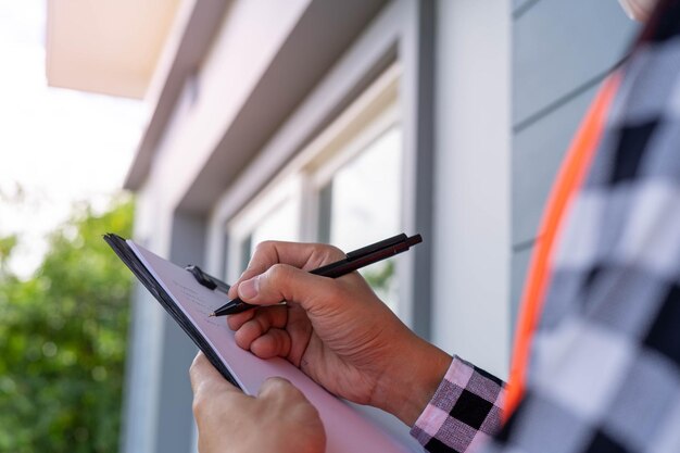 inspector-engineer-is-checking-inspecting-building-house-by-using-checklist-engineers-architects-work-building-house-before-handing-it-landlord_1375089-148