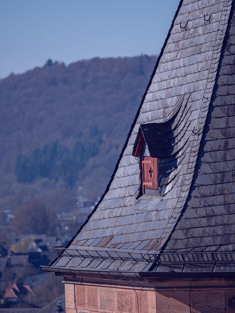 low-angle-view-cross-roof-building-against-sky_1048944-23613410