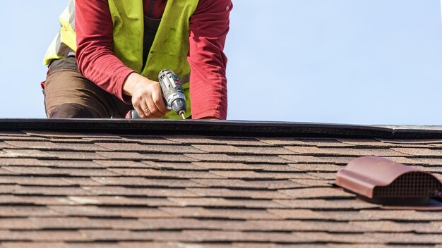 workman-install-element-tile-roof-new-home-construction_754108-3086